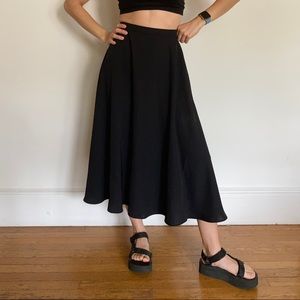 Classy black circle skirt from Uniqlo